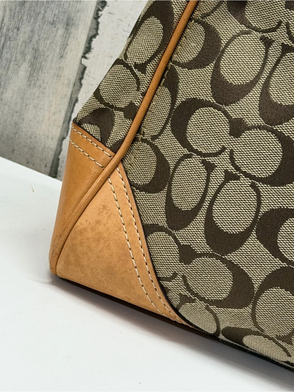 Coach iconic signature